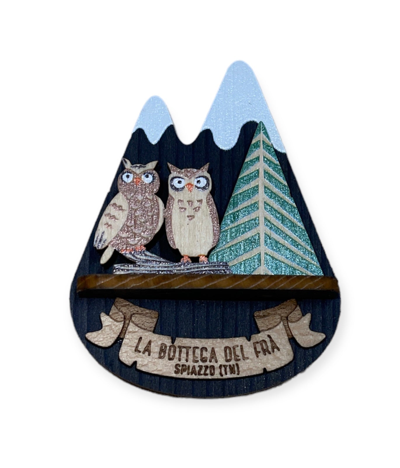 Calamita in legno cima innevata gufi