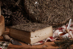 CHEESE MATURED IN MAY HAY